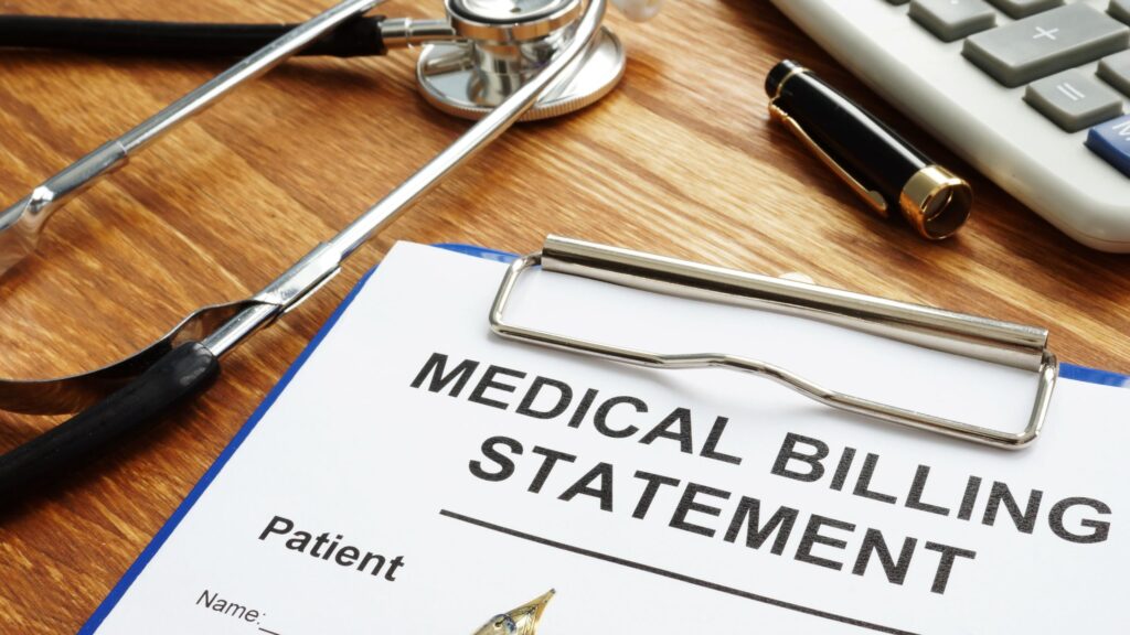 A medical billing statement clipboard with a patient's name field visible, stethoscope, and calculator, symbolizing the process of paying medical bills after a car accident in Mississippi.